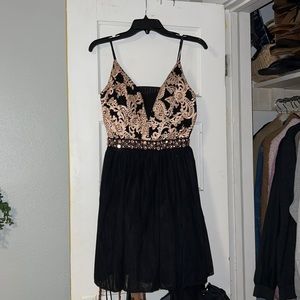 Rose gold and Black mini formal dress! Only worn once.